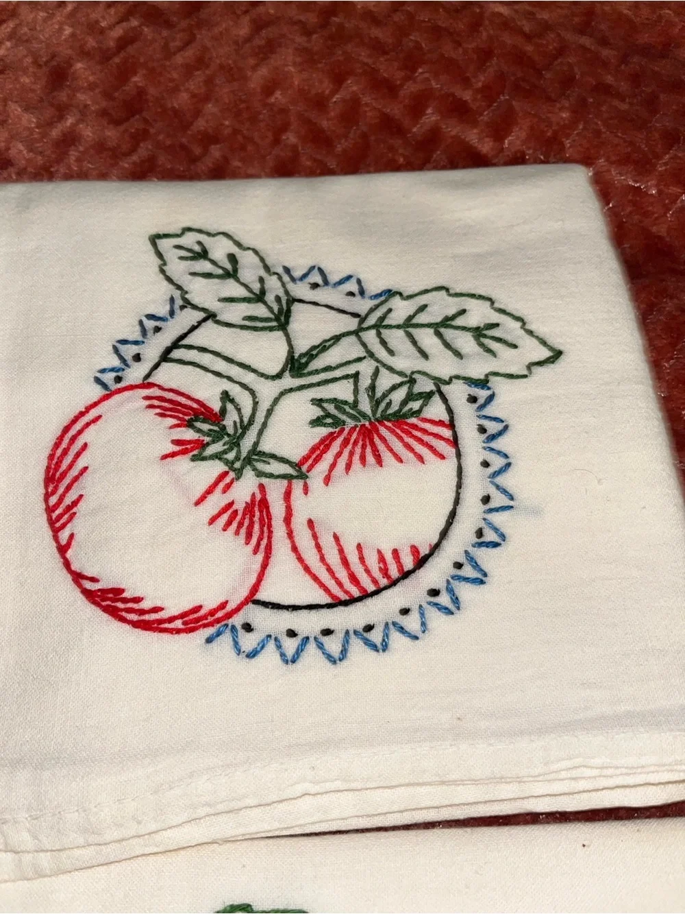 Vegetable embroidered table linens.